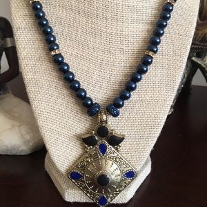 Blue beaded necklace with earrings